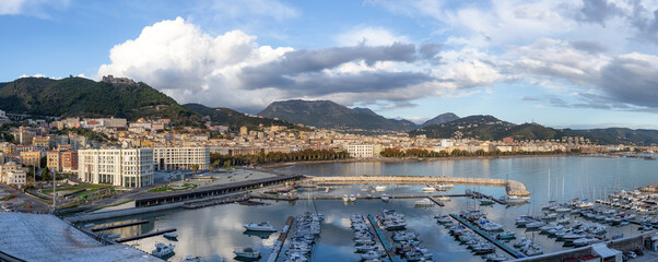 Touristic City by the Sea. Salerno, Italy. Aerial View. Cityscape and mountains background Panorama