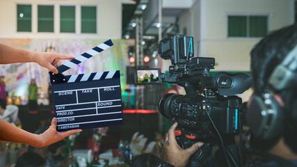 Man hands holding movie clapper.Film director concept.camera show viewfinder image catch motion in...