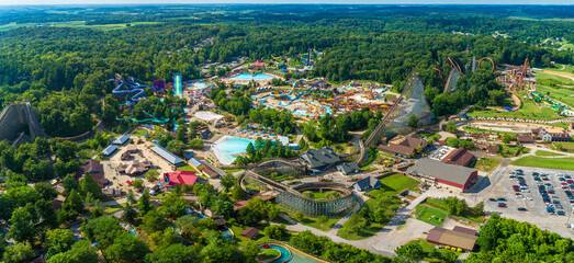Aerial view of an Amusement Park w/ Roller Coasters and Slides