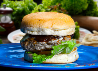 Delicious hamburger with meat bun and vegetables