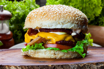 Delicious hamburger with meat bun and vegetables
