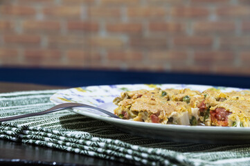 Vegetable savory pie inside a plate photographed closely