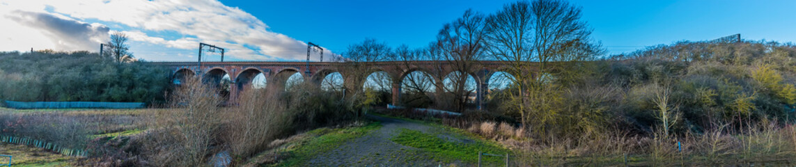 A panorama view of the Corby Viaduct on the outskirts of Corby, Northampton, UK on a bright winters day