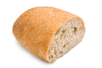 Half a freshly baked ciabatta (Italian bread) isolated on a white background.	