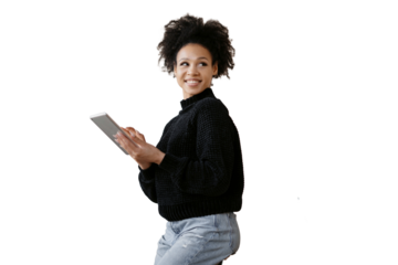 A female freelancer positive curly smiling uses a tablet, isolated transparent background.