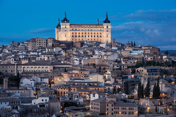 Fototapeta na wymiar Alcazar de Toledo rises over city at dusk, Toledo, Spain