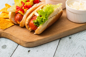 Homemade hot dogs with chilli pepper and other toppings