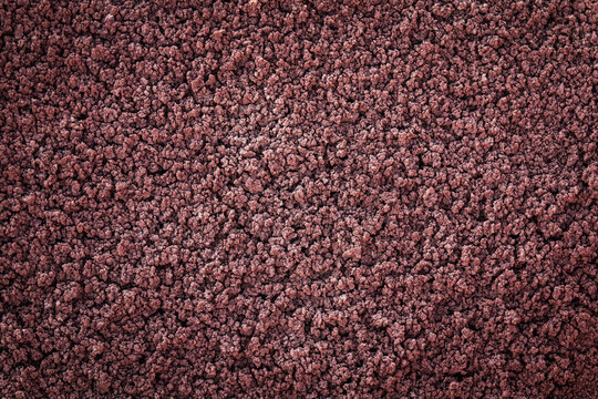 Purple volcanic lava flow basalt fields close up macro background desktop textured image with this fluffy popcorn looking effect unorganized pattern