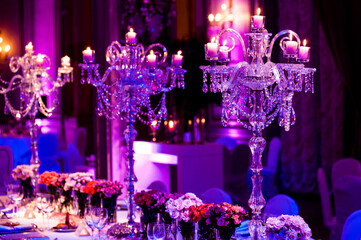 Table decorations for celebration events with lighted candles