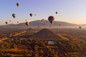 Sunrise on hot air balloon over the Teotihuacan pyramid
