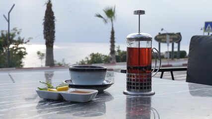 honey lemon herbal tea and french press
