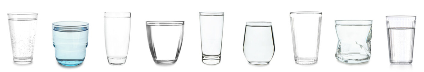 Many different glasses of water isolated on white