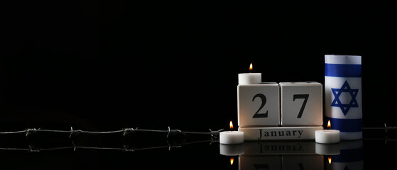 Calendar, flag of Israel, barbed wire and burning candle on dark background with space for text....