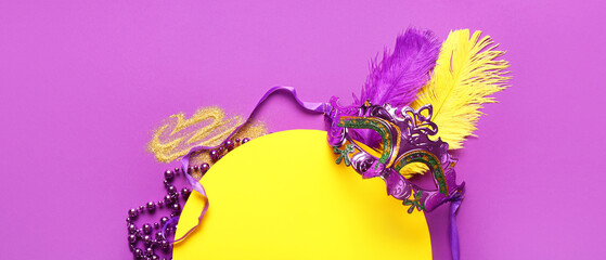 Blank greeting card with carnival mask and festive decor on violet background