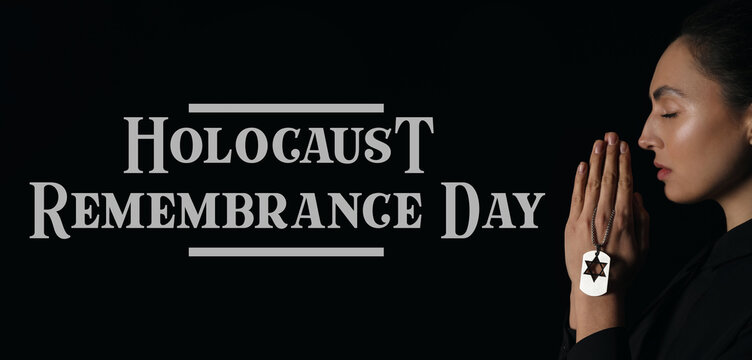 Praying Jewish woman on dark background. Banner for Holocaust Remembrance Day