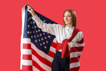 Beautiful woman with USA flag on red background