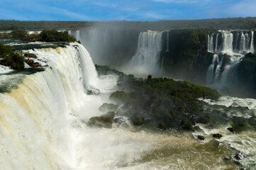 Fototapeta premium iguazu falls seen from the brazilian side in distant angles diablo throat and with its waterfalls and its vegetation