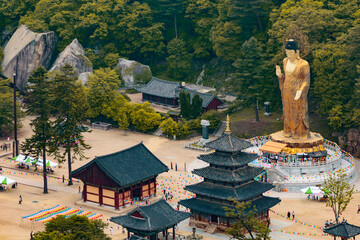Aerial view of Beopjusa temple, courtyard, pagoda and giant Buddha statue, near Cheongju, South Korea