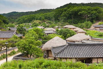 Fototapeta na wymiar YANGDONG FOLK VILLAGE, SOUTH KOREA - May 2010: general view of traditional houses (hanok), near Gyeongju, in North Gyeongsang Province (Gyeongsangbukdo)