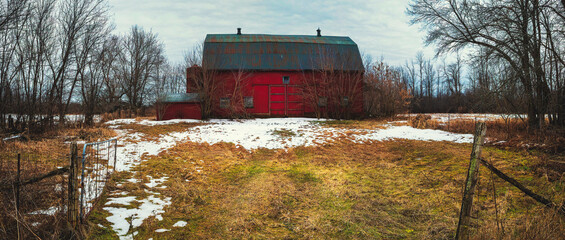 Rural winter landscapes and scenics from Ontario Canada near Kingston Ontario.  Featuring long exposures, farms and old barns with stunning moody skies - 558239790