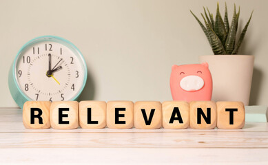 Relevant Word Written In Wooden Cube, concept