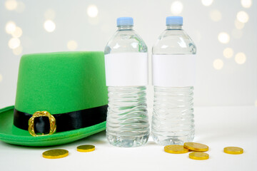 Water drink bottle labels product mockup. St Patrick's Day product mockup. Styled with green...