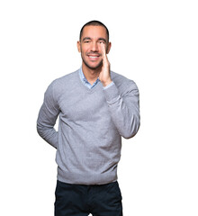 Happy young man trying to say something strongly
