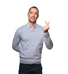 Young man making a gesture of worried about his economy