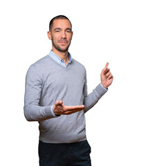 Young man waving with his hand