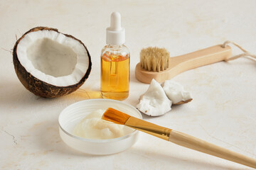 Natural organic coconut oil or serum in amber glass dropper bottle