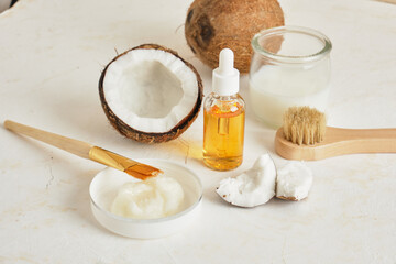 Natural organic coconut oil or serum in amber glass dropper bottle