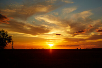 Fototapeta na wymiar sunset over the land