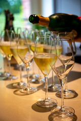 Tasting of brut and reserve champagne sparkling wine produced by traditional method in underground caves in Champagne, France