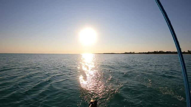 Sunset on the beach at Grand Bahama in the caribbean sea