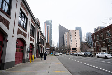 Fototapeta na wymiar City Street with Fire Station and Fog in Seattle, WA