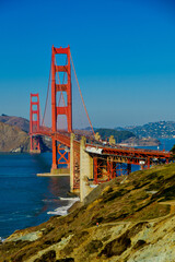 Golden Gate Bridge with blue water and beautiful blue sky