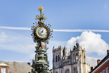 Obraz premium old street clock in front of Amiens Cathedral, Hauts-de-France, France