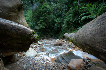 Panoramic beautiful deep forest waterfall in Nanggala III Nature Water Park, Palopo, South Sulawesi, Indonesia