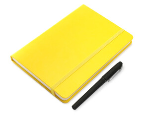 Closed yellow notebook with pen isolated on white