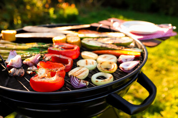 Delicious grilled vegetables on barbecue grill outdoors