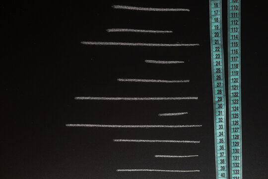 Diet list concept. list and masure tape on black background