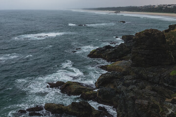 waves crashing on rocks
