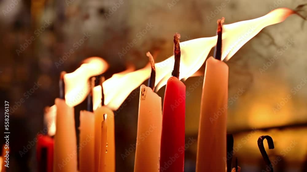 Wall mural The burning of candle used for worship in Buddhism.