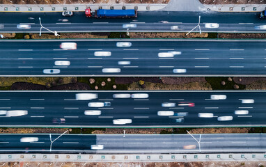 Aerial images of cars driving on urban highways