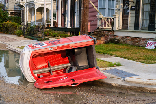 Portable Toilet Turned on its Side With an Open Door in an Uptown neighborhood on January 2, 2023 in New Orleans, LA, USA
