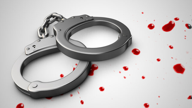 Handcuff with red blood splatter crime scene