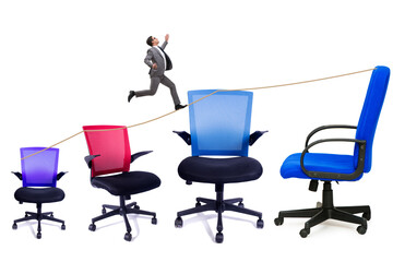 Promotion concept with businessman and chairs