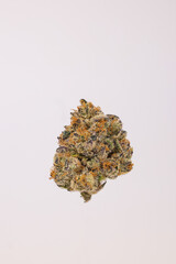 Single Dried Cannabis Nug on White Background