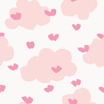 Puffy love clouds design forming sky with clouds and hearts in a subtle color palette of pink and peach over off white background. Great for home decor, fabric, wallpaper, gift wrap and stationery.
