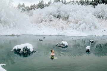 Woman relax in warm springs water